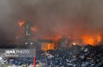 تصاویر آتش سوزی کارخانه کفش در قم